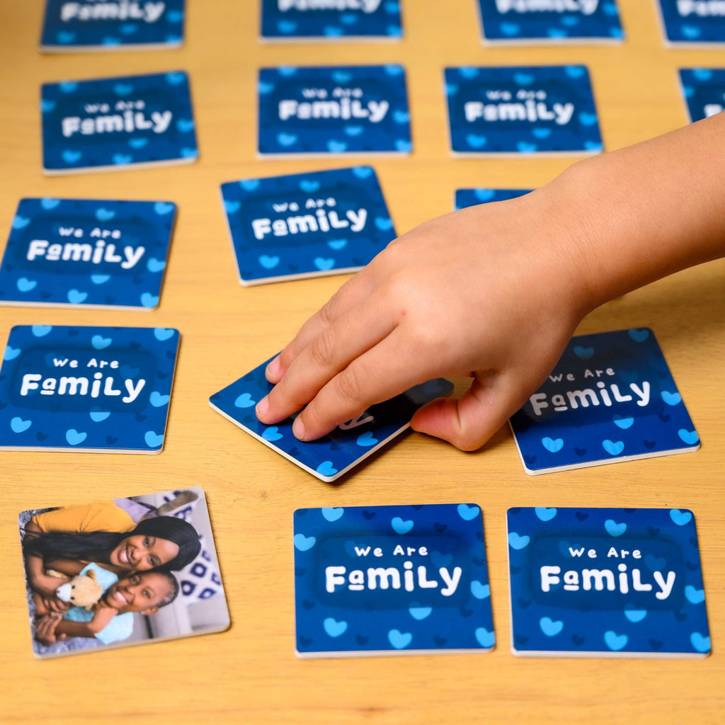 Girl Playing ABSee Me's We Are Family Memory Game - Fun and Educational Activity for Kids